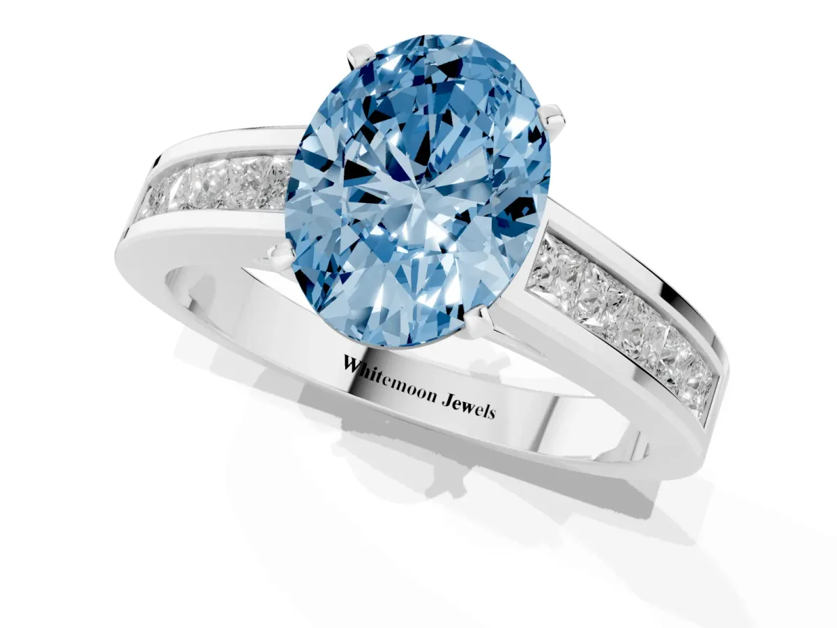 Fancy Blue Oval Cut Solitaire Diamond Ring with Channel-Set Band and Four-Prong Setting Silver