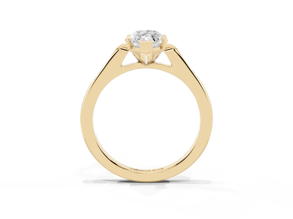 Marquise Cut Diamond Solitaire Ring with Channel Set Round Band and Prong Setting Yellow gold