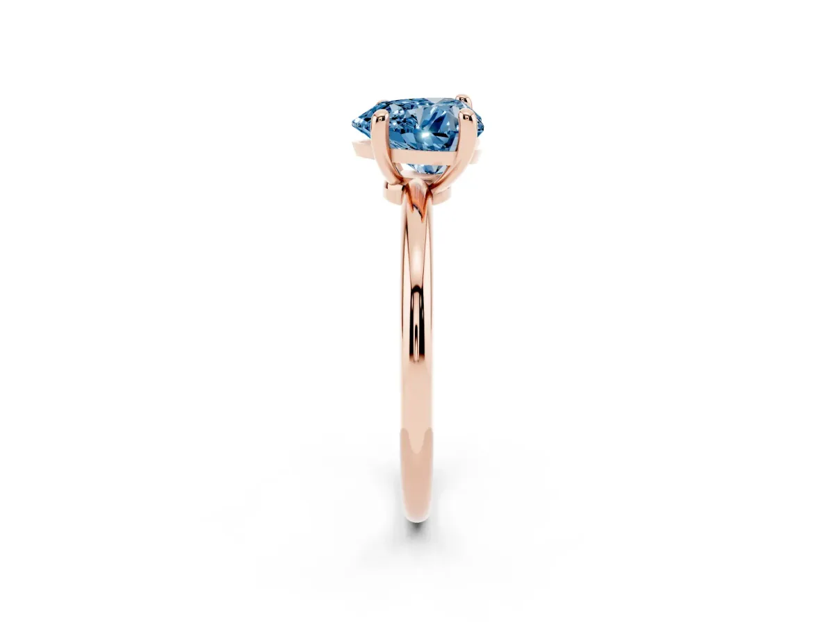 Fancy Blue Heart Cut Solitaire Diamond Ring with 4-Prong Setting on a Classic Band Rose gold