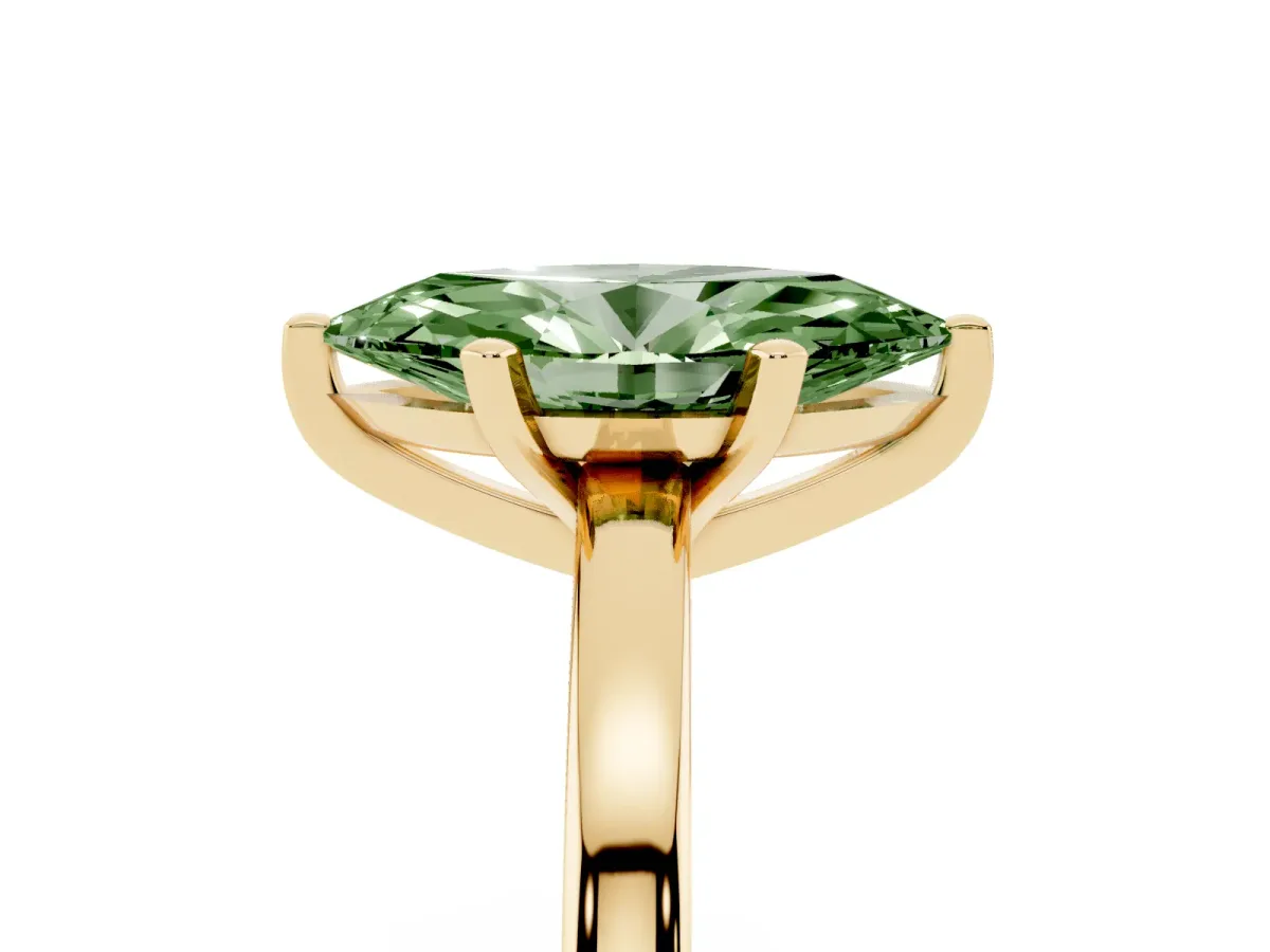 Fancy Green Marquise Cut Solitaire Diamond Engagement Ring with Four-Prong Setting on a Classic Band Yellow gold
