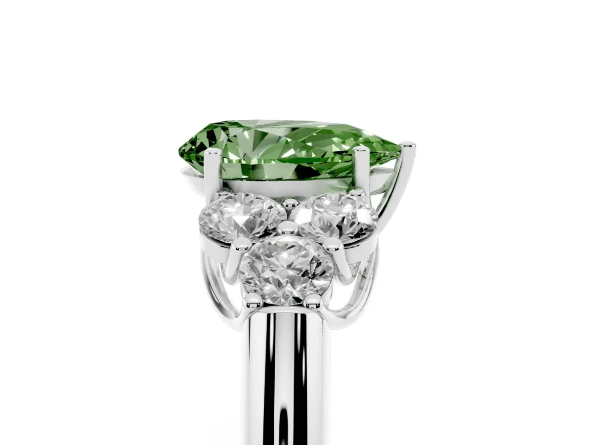 Fancy Green Pear Cut Cut Diamond Cluster Ring with Round Accent Stones and Prong Setting on a Classic Band White gold