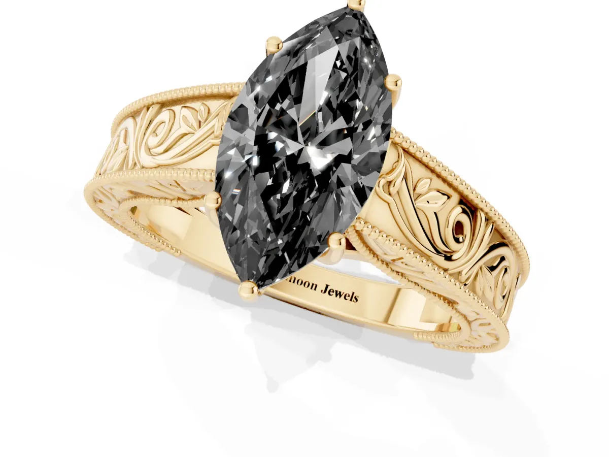Fancy Black Marquise Cut Diamond Solitaire Ring with Engraved Band and Four-Prong Setting Yellow gold