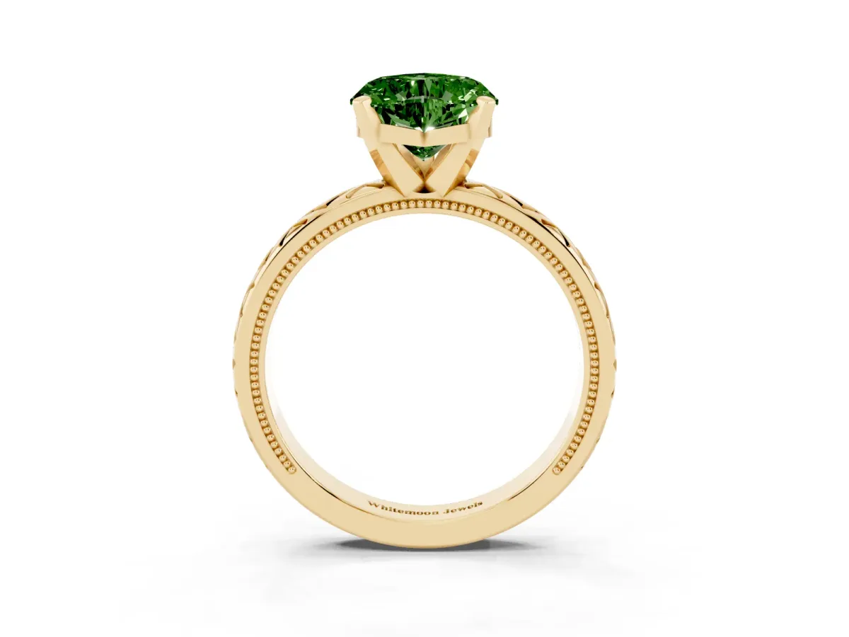 Fancy Green Heart Cut Solitaire Diamond Ring with Milgrain and Black Enamel X Pattern Band Yellow gold