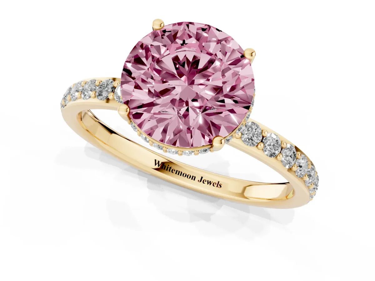Fancy Pink Round Cut Diamond Solitaire Ring with Pavé Band and Hidden Halo Yellow gold