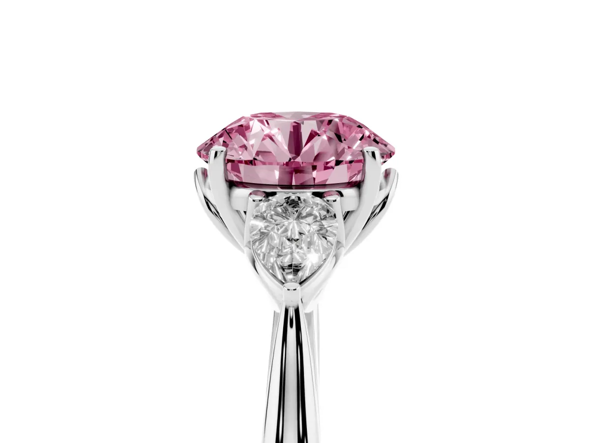 Fancy Pink Three-Stone Round Cut Brilliant Diamond Solitaire Ring with Tapered Band and Four-Prong Setting Silver
