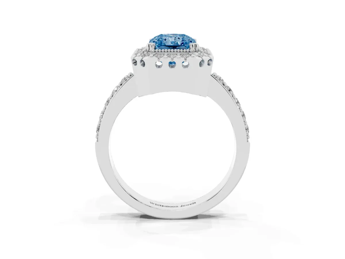 Fancy Blue Radiant Cut Diamond Halo Ring with Pavé Band and Prong Setting Platinum