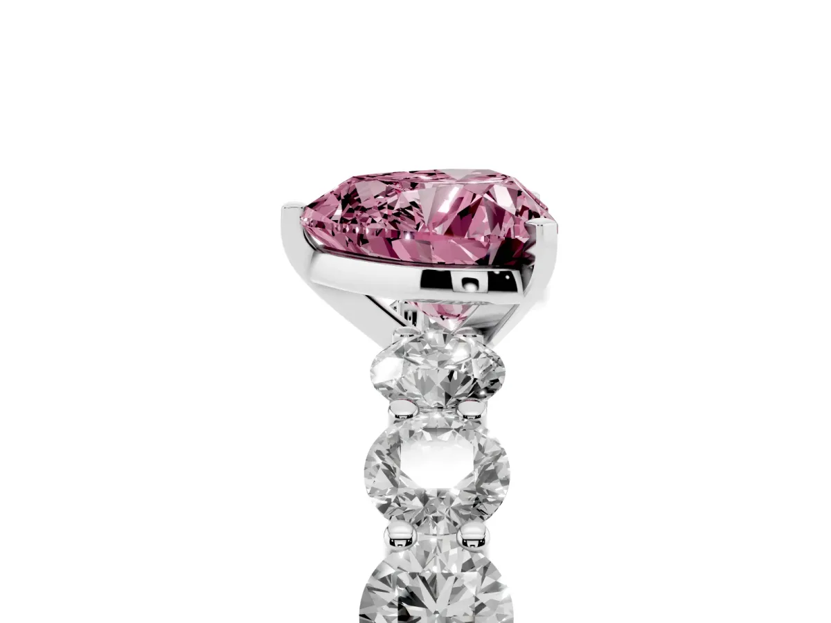 Fancy Pink Heart Cut Diamond Prong Setting with Side Stones on a Pave Band Silver