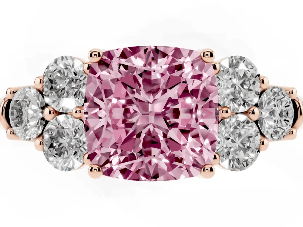 Fancy Pink Cushion Cut Cut Diamond Cluster Ring with Round Accent Stones and Prong Setting on a Classic Band Rose gold