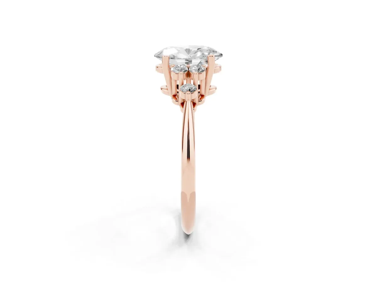 Oval Cut Cut Diamond Cluster Ring with Solitaire Band and Four-Prong Setting Rose gold