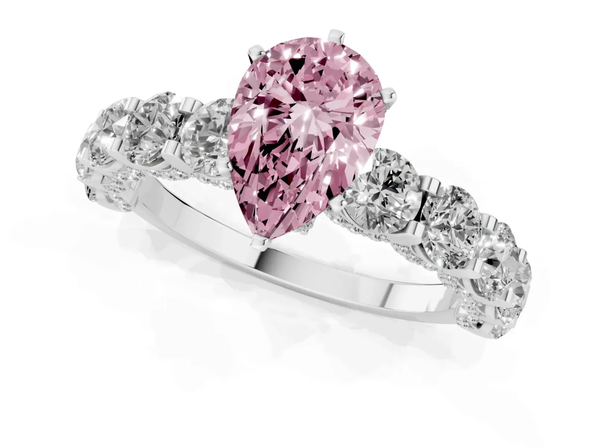 Fancy Pink Pear Cut Diamond Side Stone Engagement Ring with Four-Prong Setting Platinum