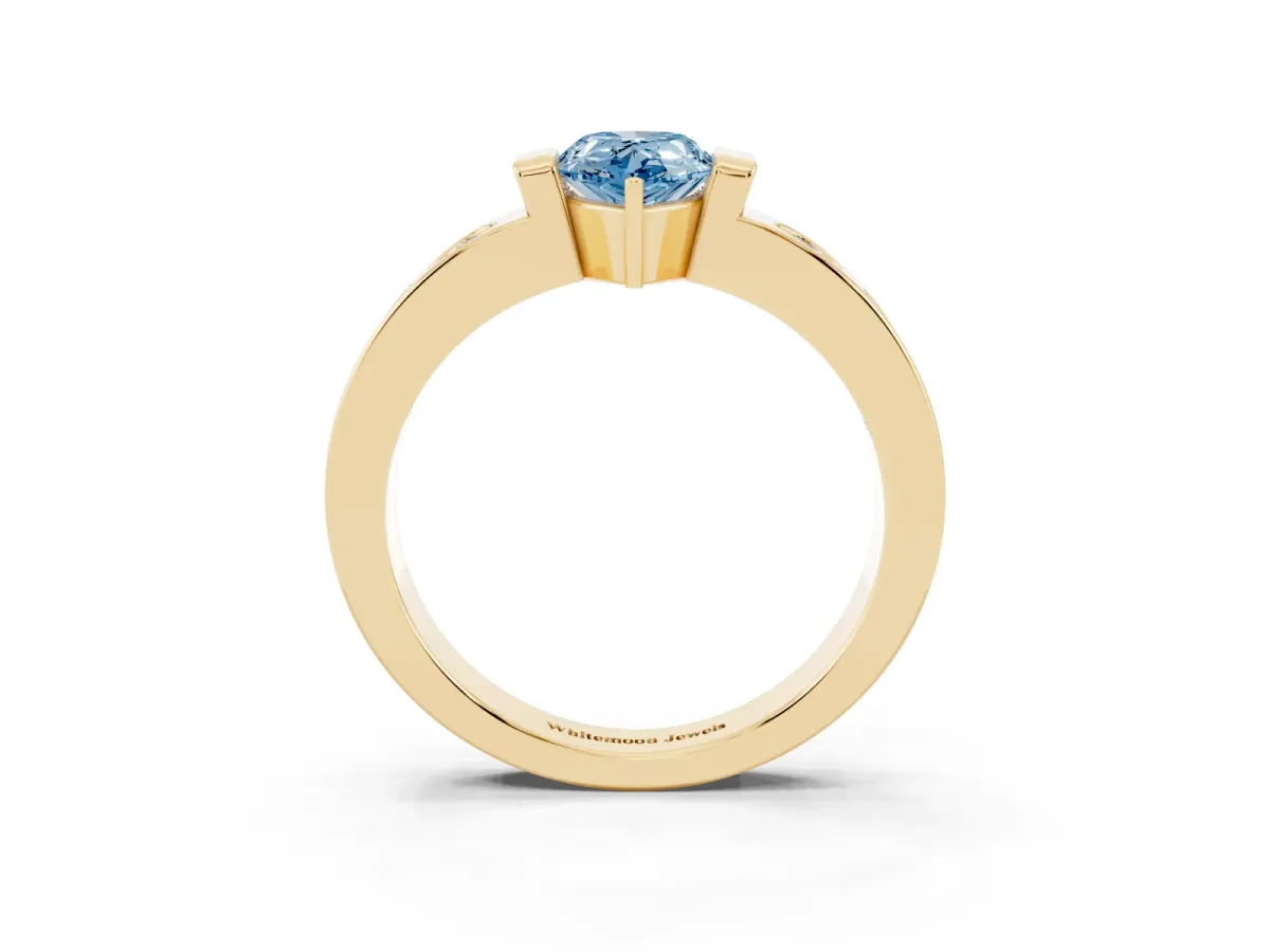 Fancy Blue Pear Cut Brilliant Channel-Set Diamond Ring with Bezel Prong Setting Yellow gold