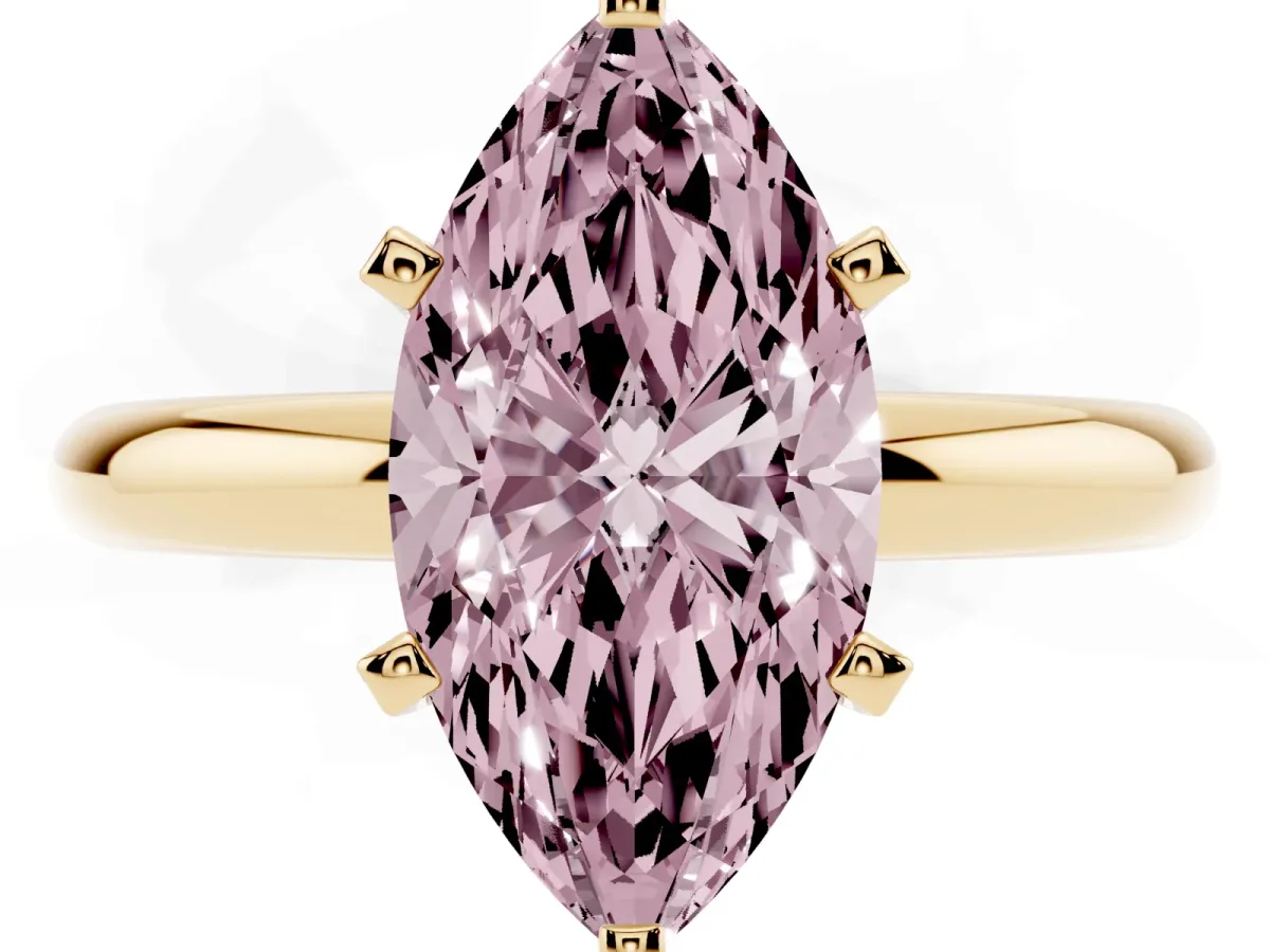 Fancy Pink Marquise Cut Diamond Solitaire Engagement Ring with Round Band and Four-Prong Setting Yellow gold