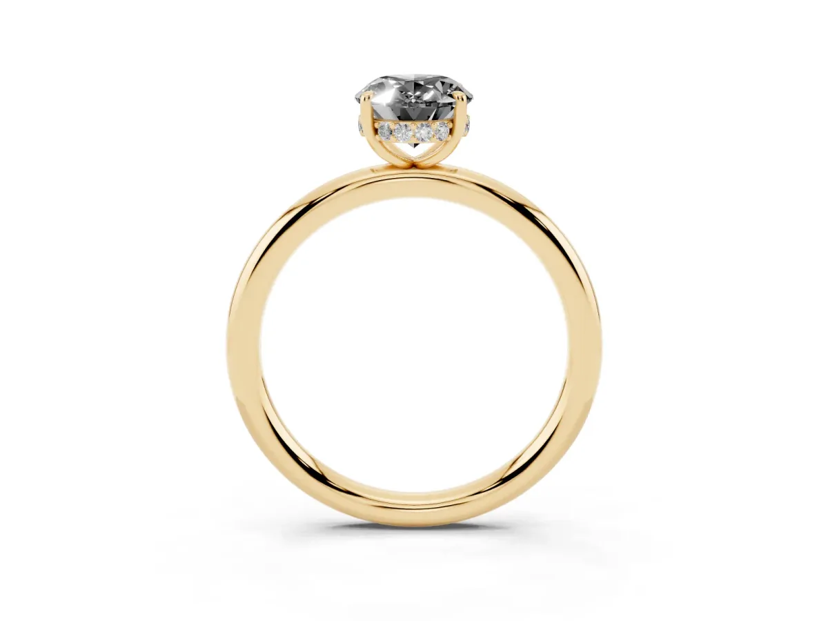 Fancy Black Oval Cut Diamond Solitaire Ring with Thin Band and Four-Prong Setting Yellow gold