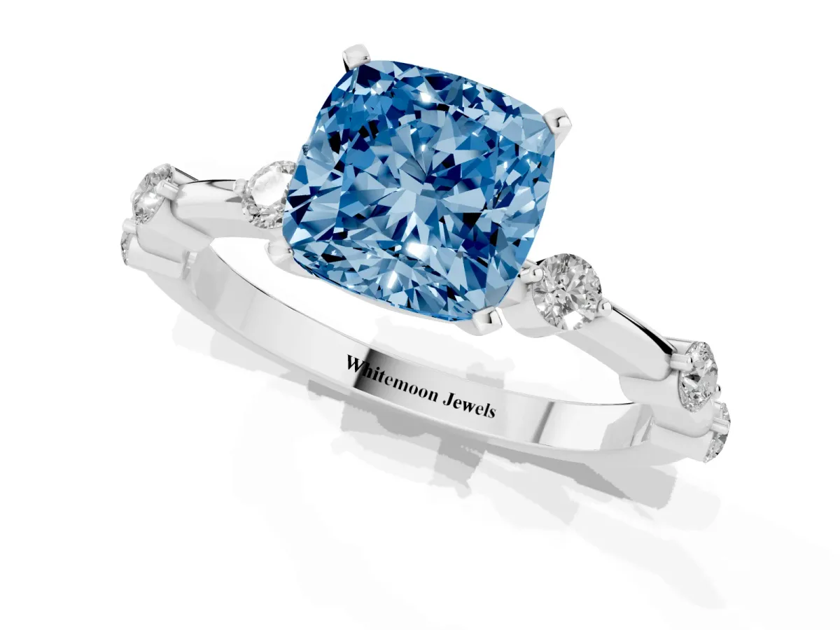 Fancy Blue Cushion Cut Solitaire Diamond Ring with Bezel Set Side Stones and Prong Setting Platinum