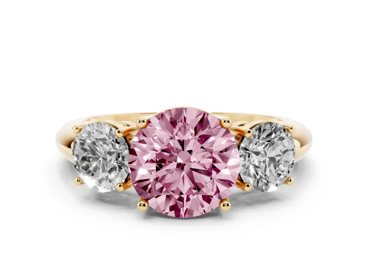 Fancy Pink Three-Stone Round Cut Cut Diamond Engagement Ring with Prong Setting on a White Gold Band Yellow gold