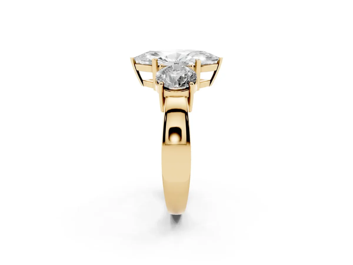 Three-Stone Marquise Cut Diamond Ring with Round Side Stones, Classic Band, and Four-Prong Setting Yellow gold