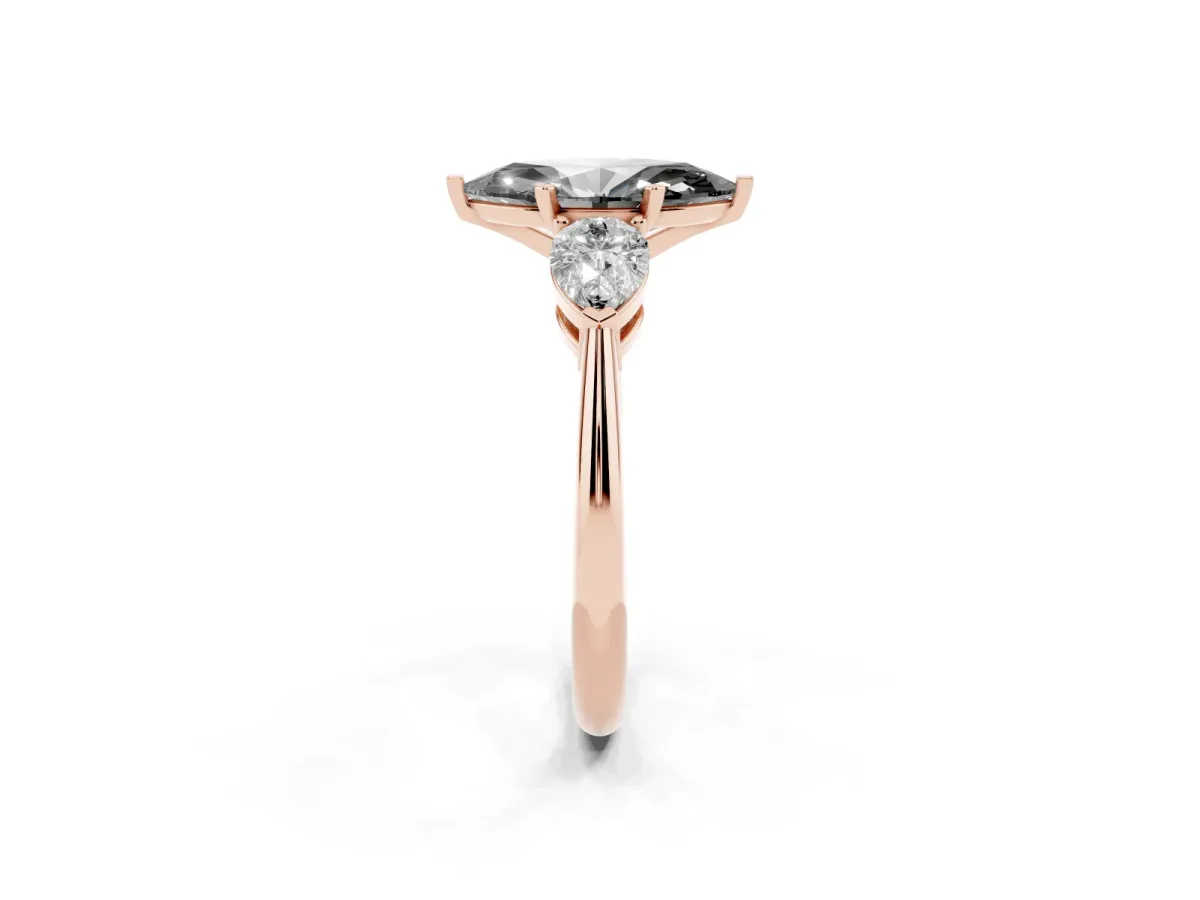 Fancy Black Three-Stone Marquise Cut Diamond Ring with Pear Side Stones and Four-Prong Setting Rose gold