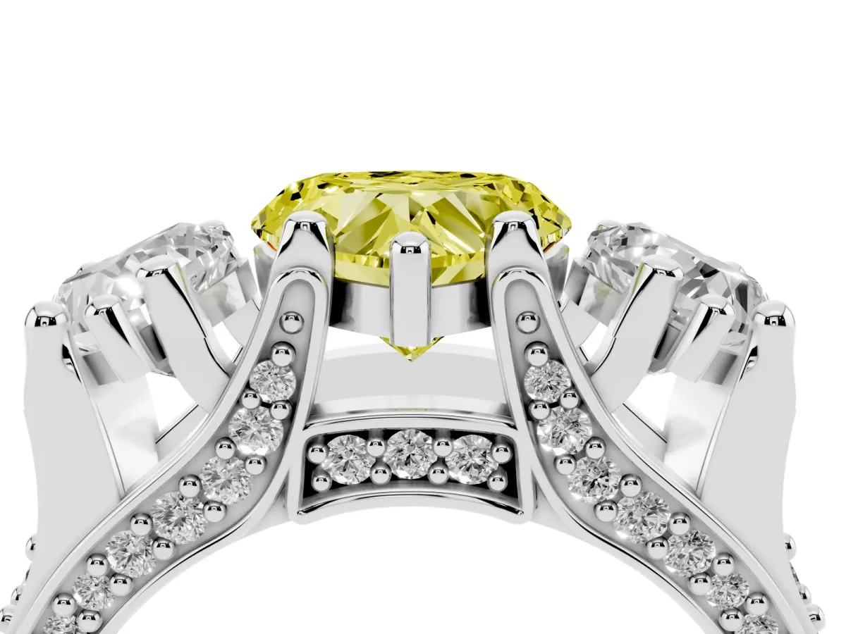 Fancy Yellow Heart Cut Diamond Three-Stone Ring with Channel Set Band and Four-Prong Setting White gold