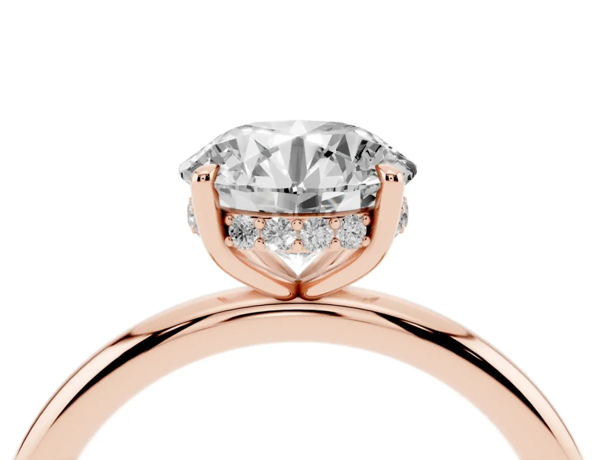 Round Cut Diamond Solitaire Ring with Thin Band and Four-Prong Setting Rose gold