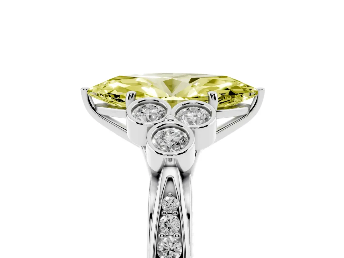 Fancy Yellow Marquise Cut Cut Diamond Engagement Ring with Bezel Set Round Side Stones and Prong Setting Silver