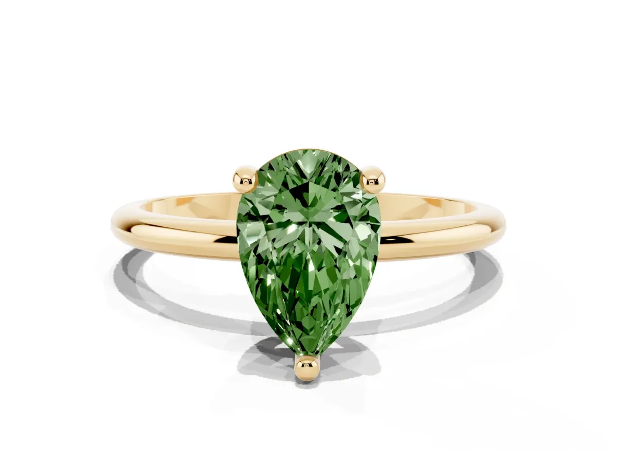 Fancy Green Pear Cut Solitaire Diamond Ring with 4-Prong Setting on a Classic Band Yellow gold