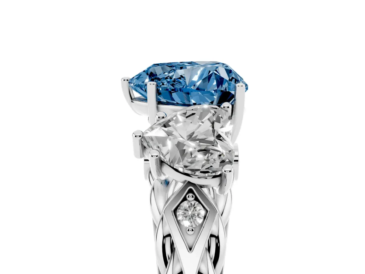 Fancy Blue Three-Stone Heart Cut Diamond Braided Band Ring with Four-Prong Setting Platinum