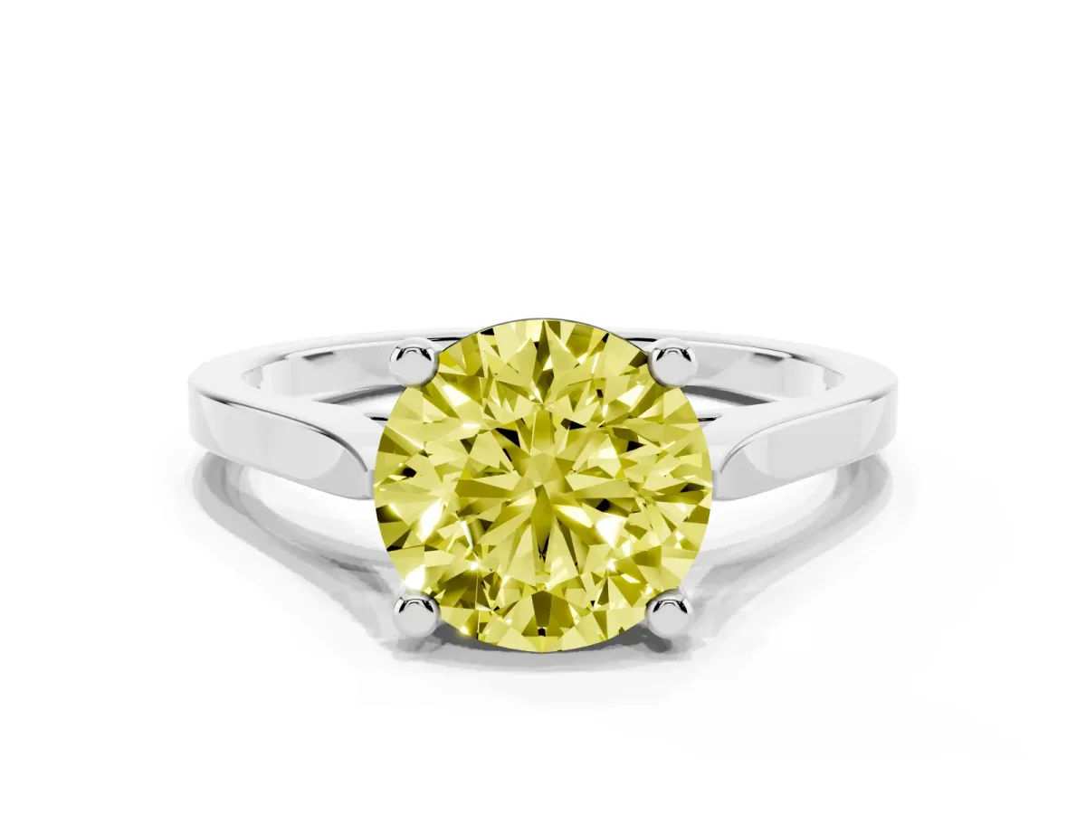 Fancy Yellow Round Cut Solitaire Diamond Ring with Four-Prong Setting and Tapered Band Silver