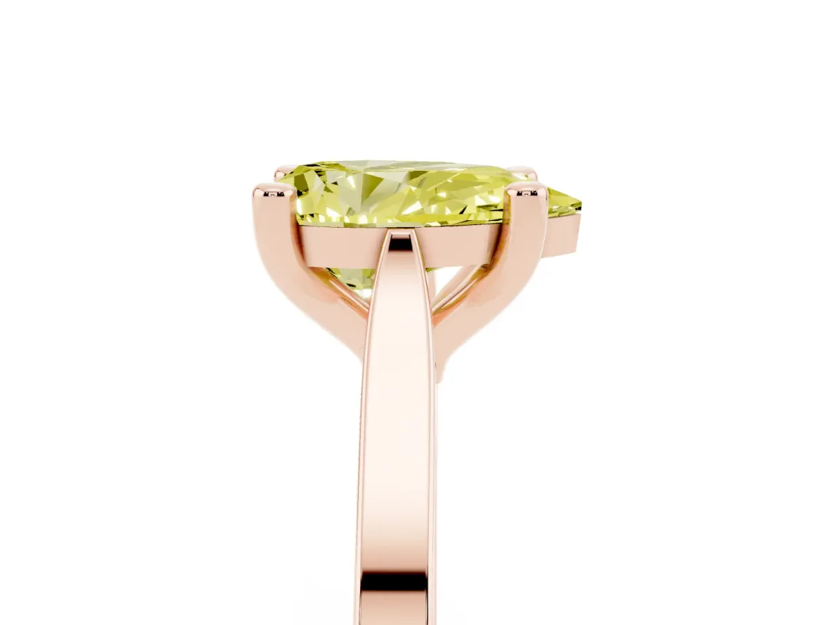 Fancy Yellow Pear Cut Solitaire Diamond Ring with Four-Prong Setting and Tapered Band Rose gold