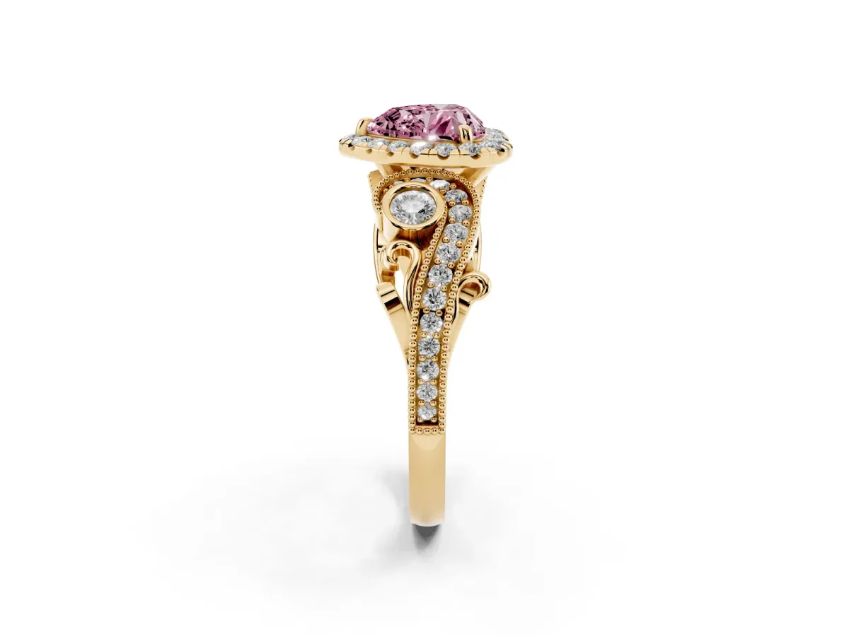 Fancy Pink Heart Cut Halo Diamond Ring with Milgrain and Bezel Accents on a Split Shank Band Yellow gold