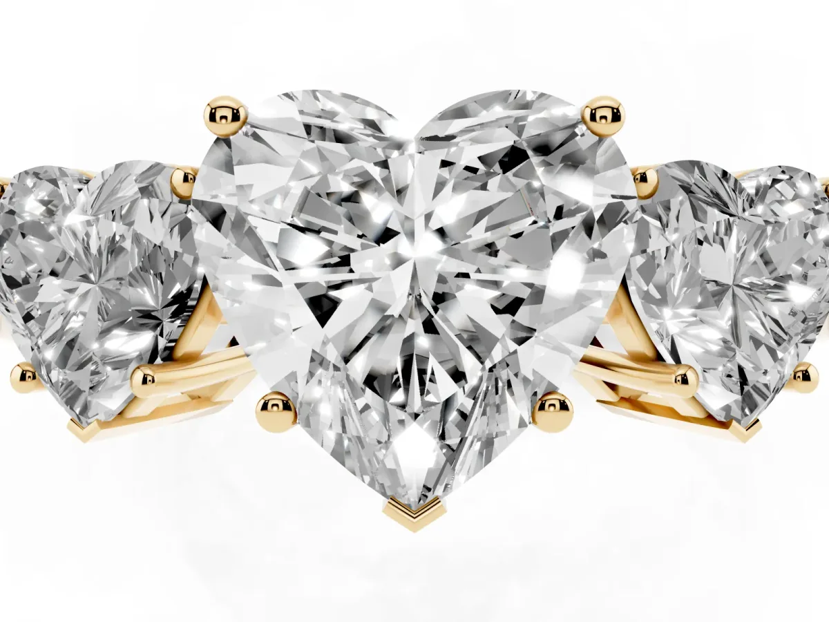 Three-Stone Heart Cut Cut Diamond Engagement Ring with Flat Band and Four-Prong Setting Yellow gold