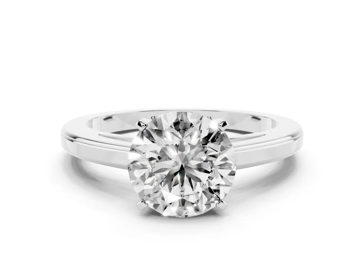 Round Cut Solitaire Diamond Ring with Four-Prong Setting and Classic Band Platinum