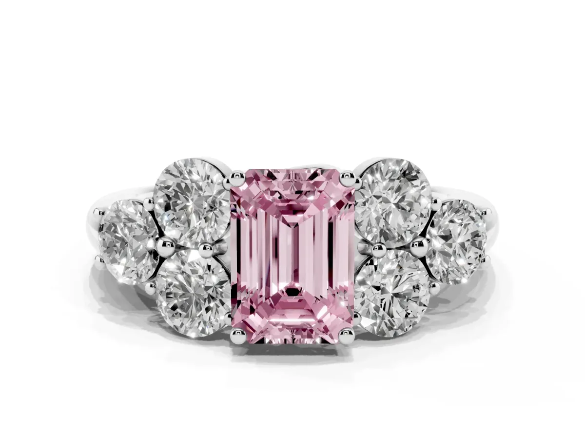 Fancy Pink Emerald Cut Cut Diamond Cluster Ring with Round Accent Stones and Prong Setting on a Classic Band Silver