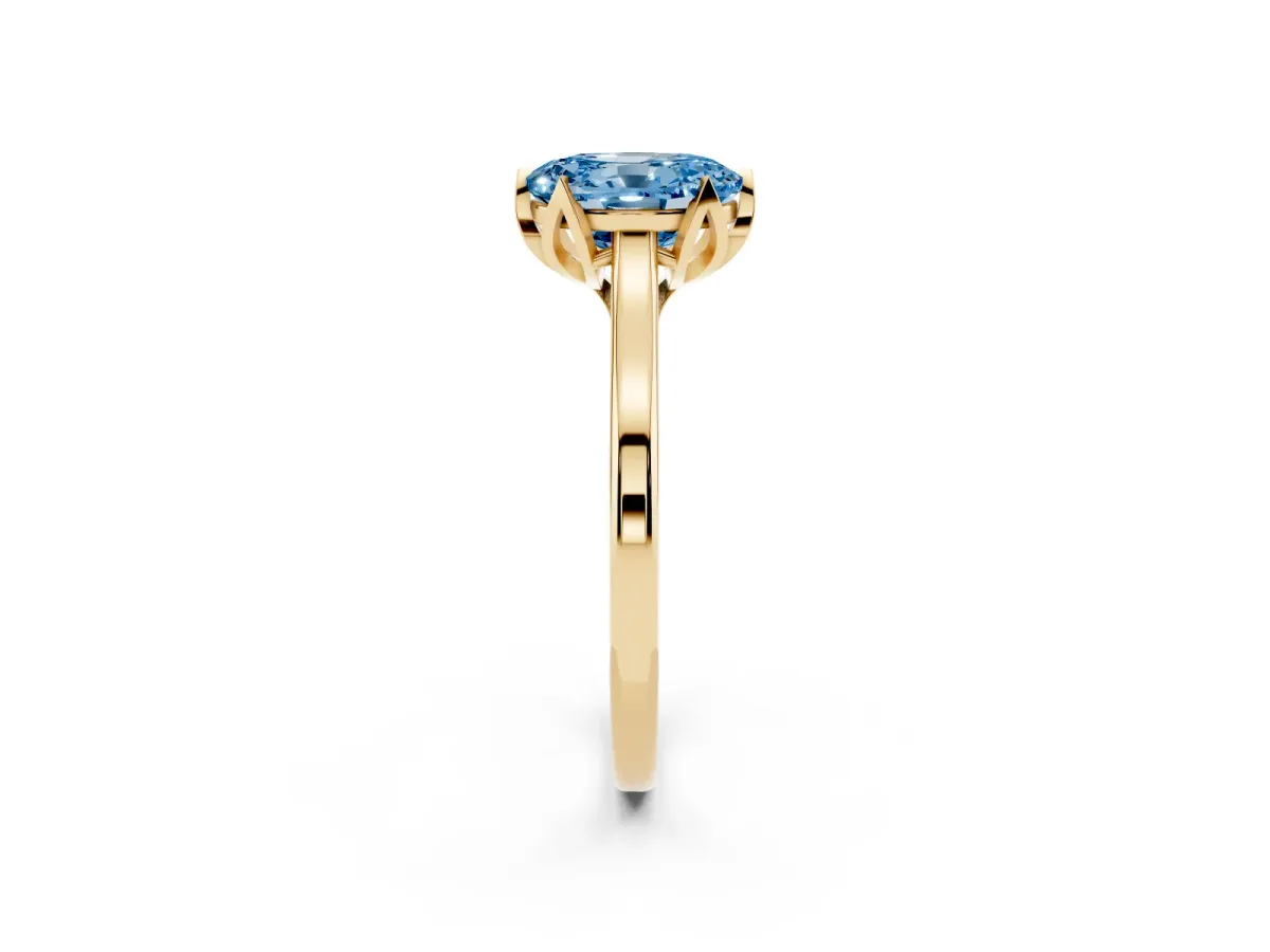 Fancy Blue Oval Cut Diamond Solitaire Ring with Flower Prong Setting and Classic Band Yellow gold