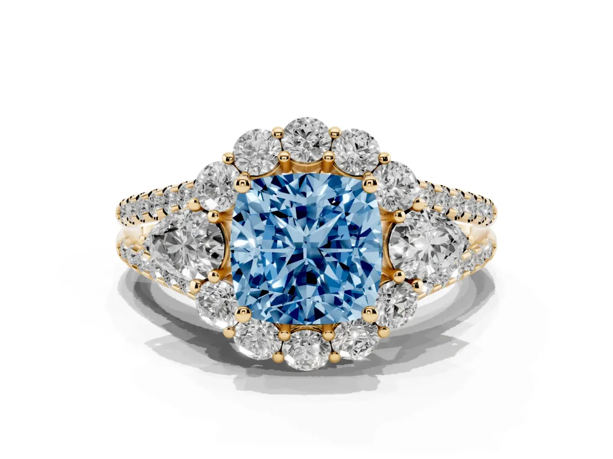 Fancy Blue Cushion Cut Halo Split Shank Diamond Engagement Ring with Prong Setting Yellow gold