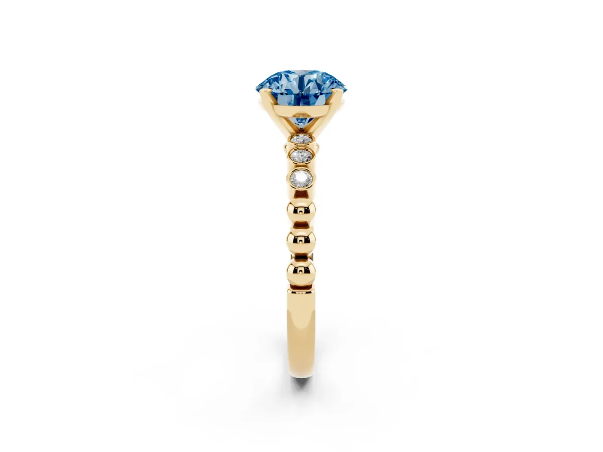 Fancy Blue Round Cut Solitaire Bezel Accent Diamond Engagement Ring with Beaded Band and Four-Prong Setting Yellow gold