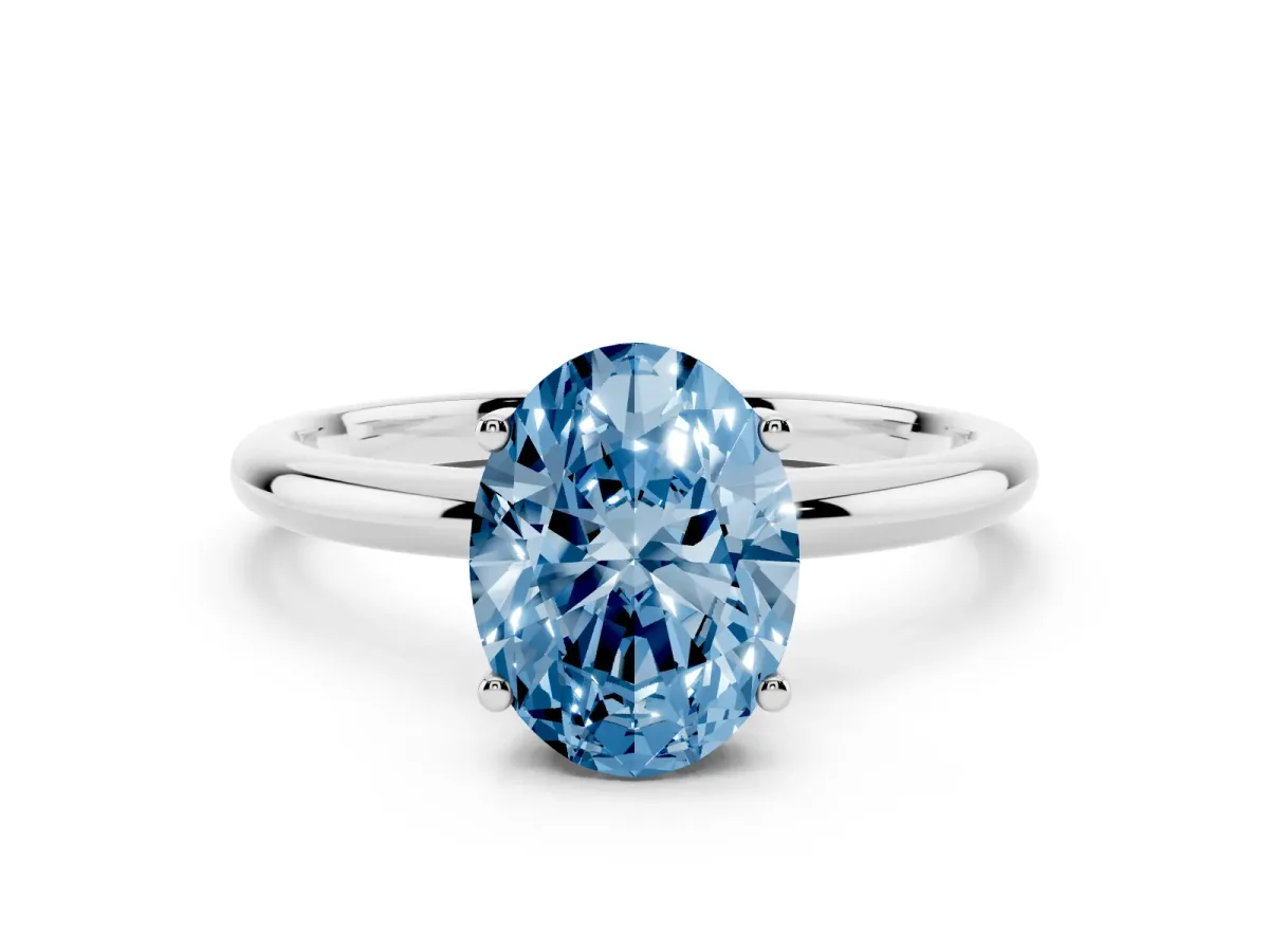 Fancy Blue Oval Cut Cut Solitaire Engagement Ring with Four-Prong Setting and Classic Band Silver