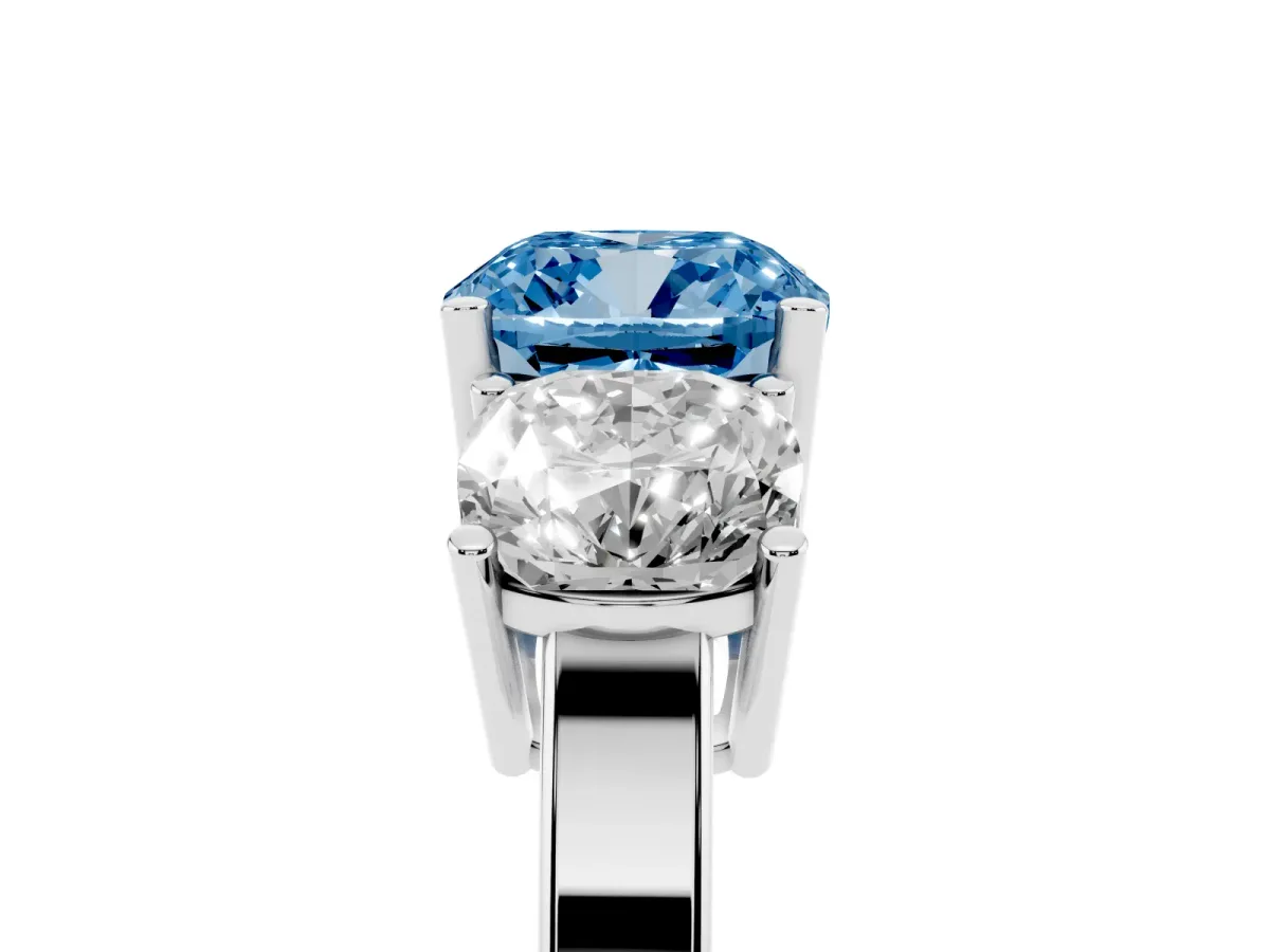 Fancy Blue Three-Stone Cushion Cut Cut Diamond Engagement Ring with Flat Band and Four-Prong Setting Silver