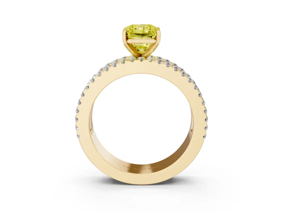 Fancy Yellow Radiant Cut Diamond Solitaire Ring with Pavé and Channel Set Band Yellow gold