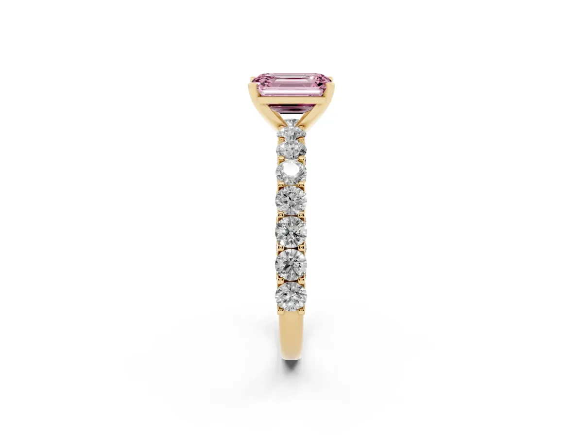 Fancy Pink Emerald Cut Diamond Solitaire Ring with Shared Prong Pavé Band and Four-Prong Setting Yellow gold