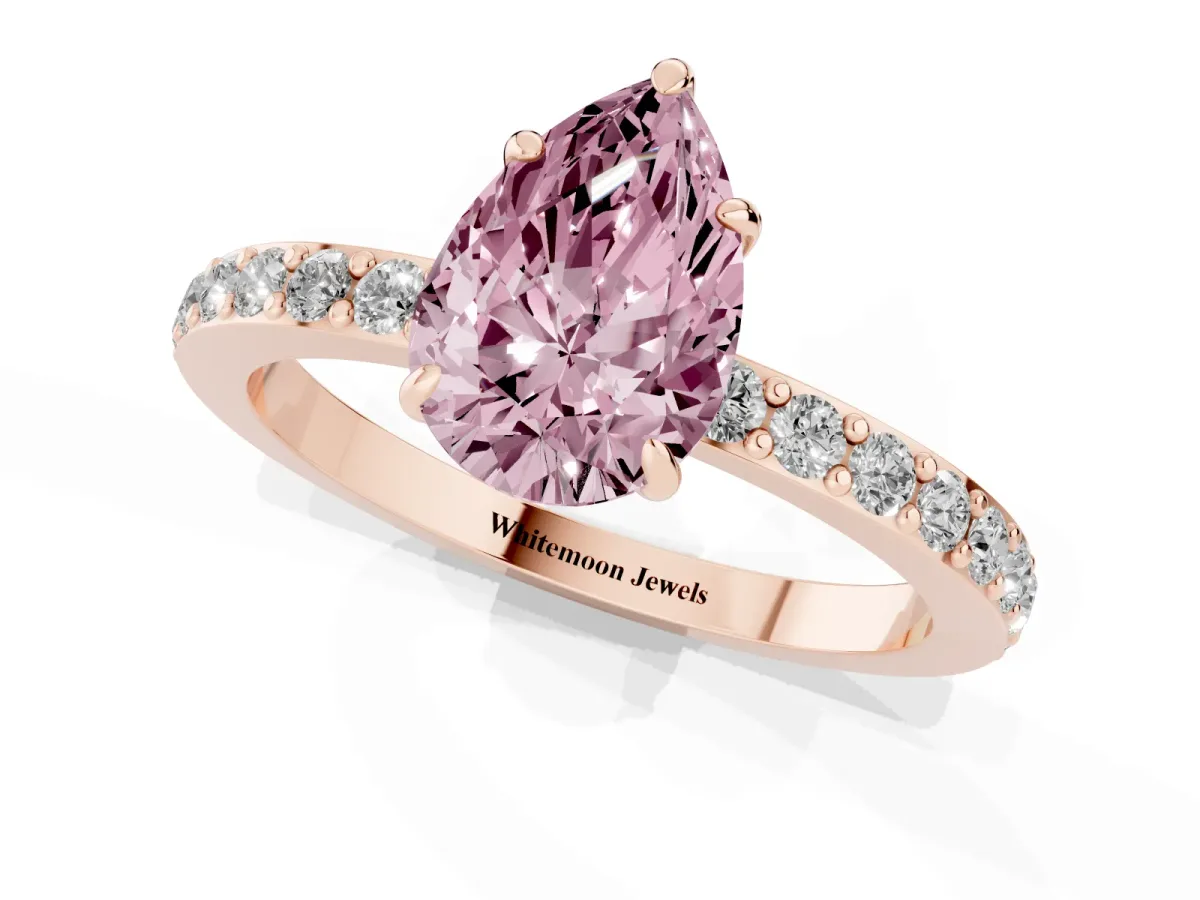 Fancy Pink Pear Cut Diamond Pavé Engagement Ring with Round Accents and Prong Setting Rose gold