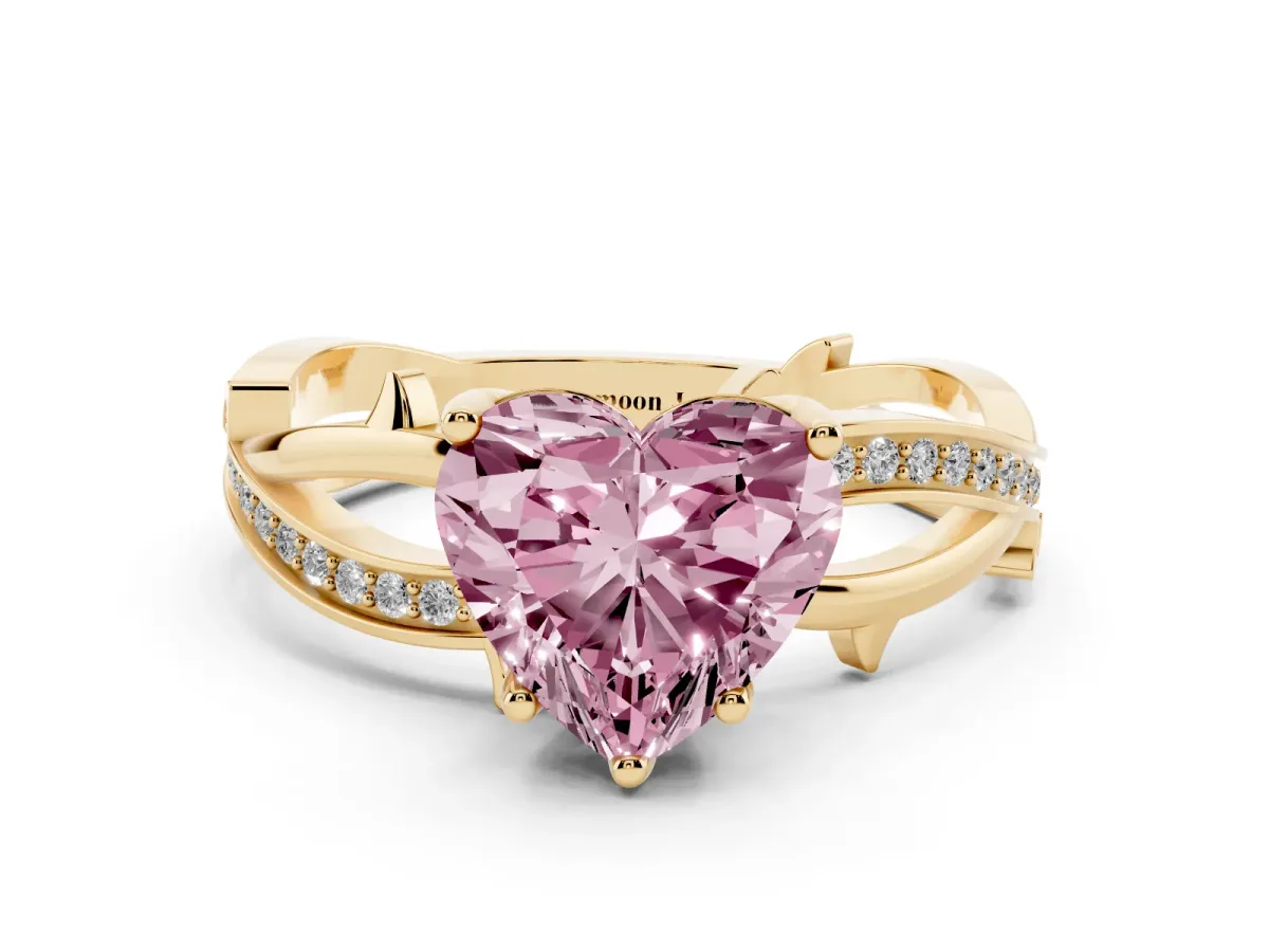 Fancy Pink Heart Cut Solitaire Twist Band with Pavé Accents and Four-Prong Setting Yellow gold