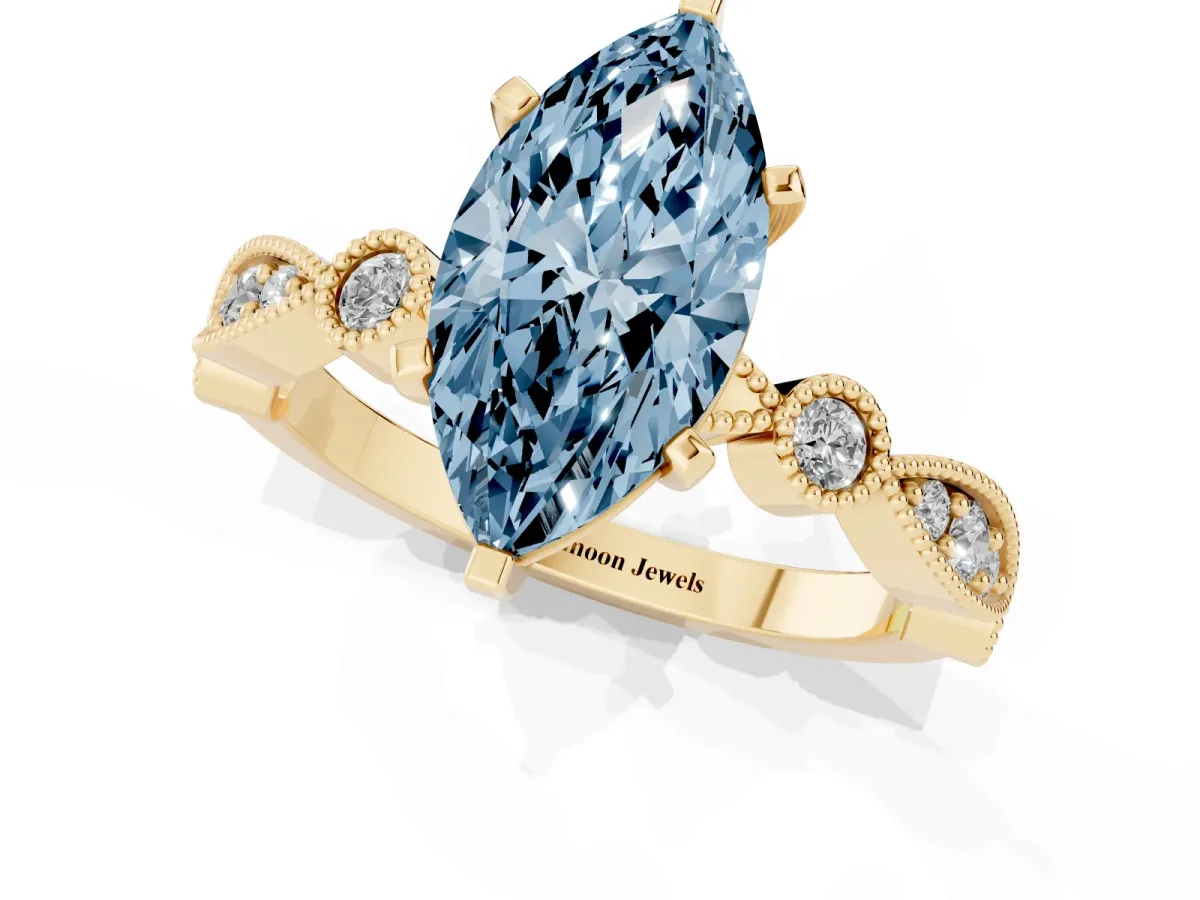 Fancy Blue Marquise Cut Milgrain Bezel Diamond Engagement Ring with Solitaire Prong Setting Yellow gold