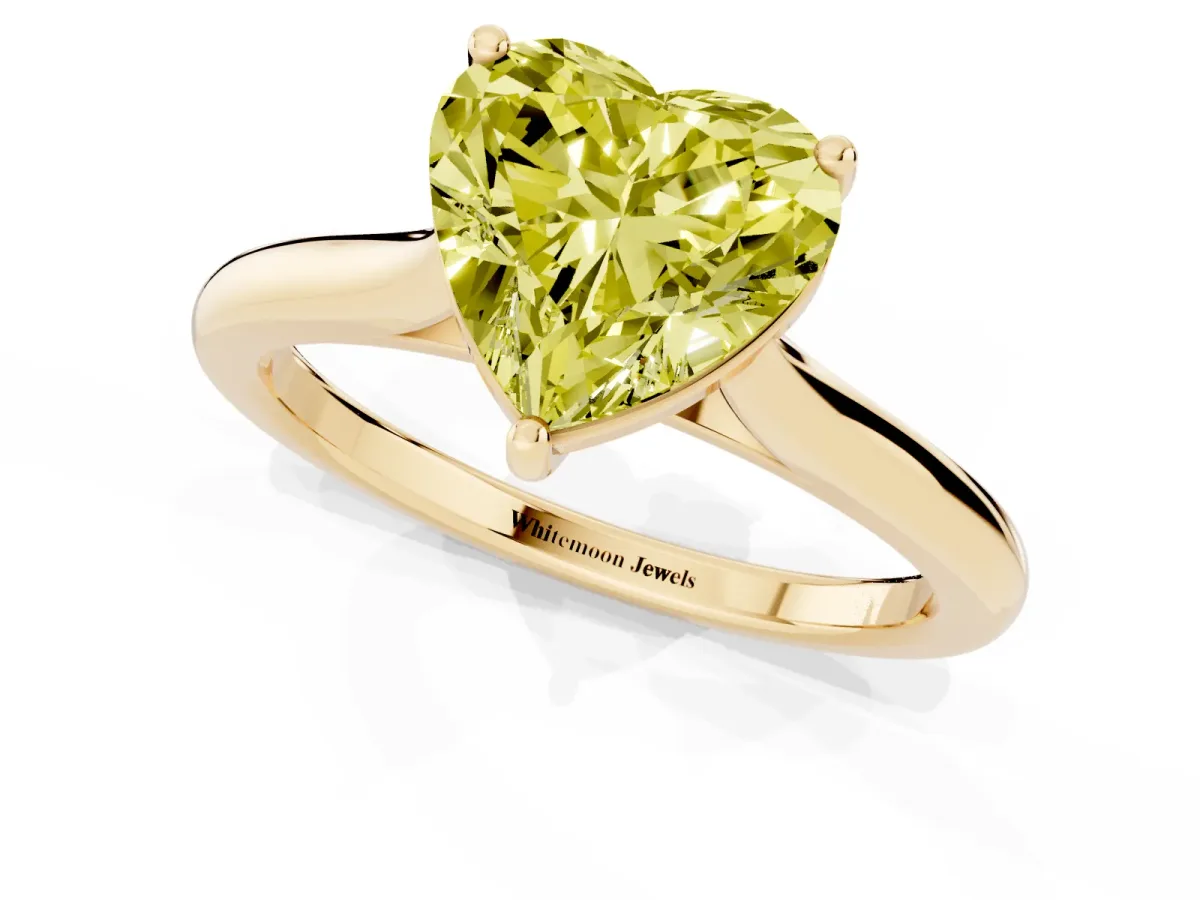 Fancy Yellow Heart Cut Cut Solitaire Ring with Cathedral Band and Four-Prong Setting Yellow gold
