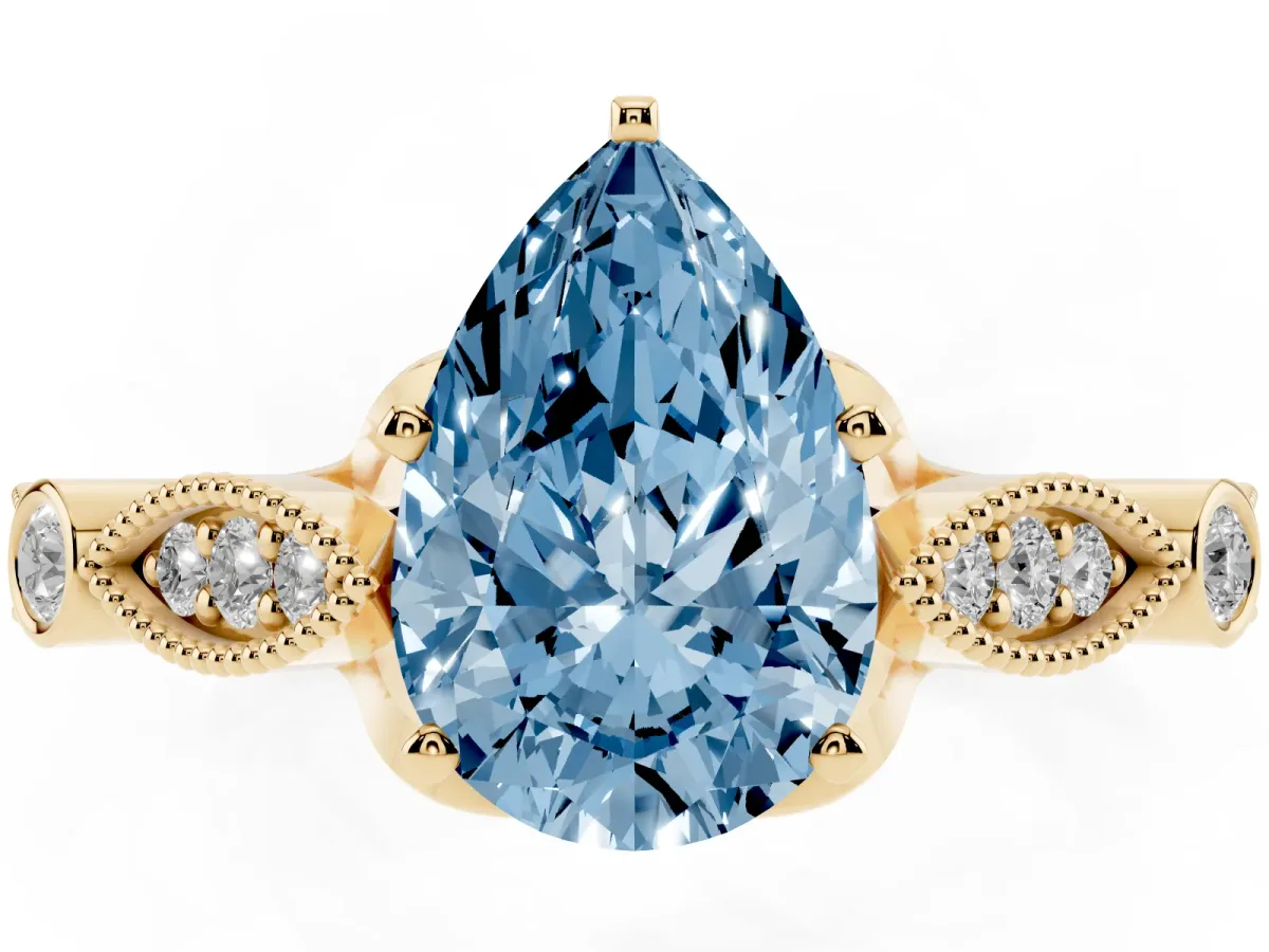 Fancy Blue Pear Cut Cut Diamond with Milgrain Marquise and Bezel Accents on a Solitaire Band with Prong Setting Yellow gold