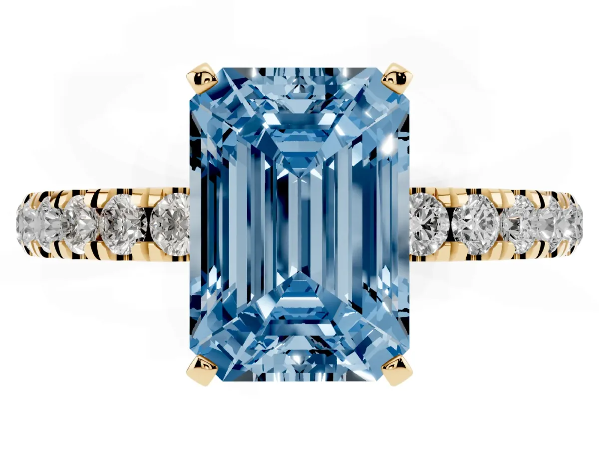 Fancy Blue Emerald Cut Diamond Solitaire Ring with Pavé Accents and Four-Prong Setting Yellow gold