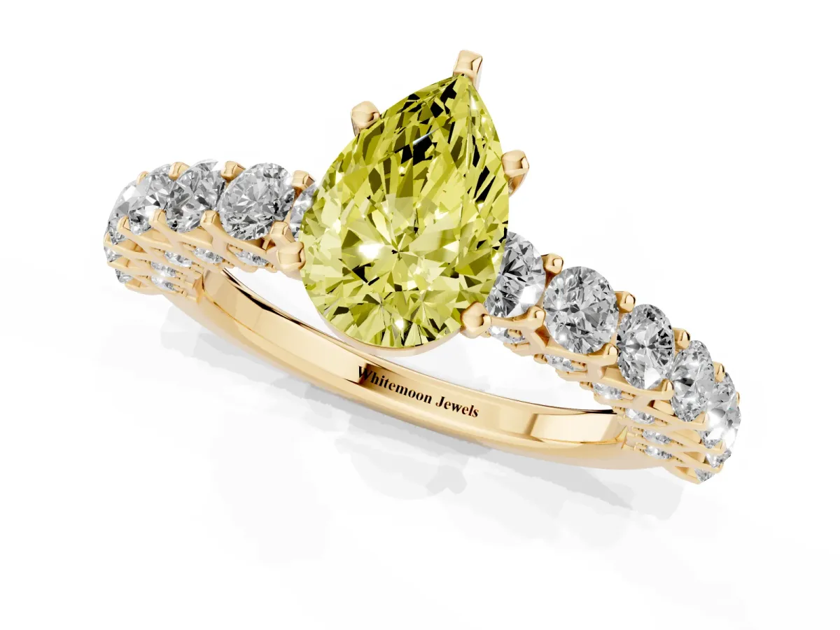 Fancy Yellow Pear Cut Diamond Solitaire Ring with Shared Prong Pavé Band and Four-Prong Setting Yellow gold