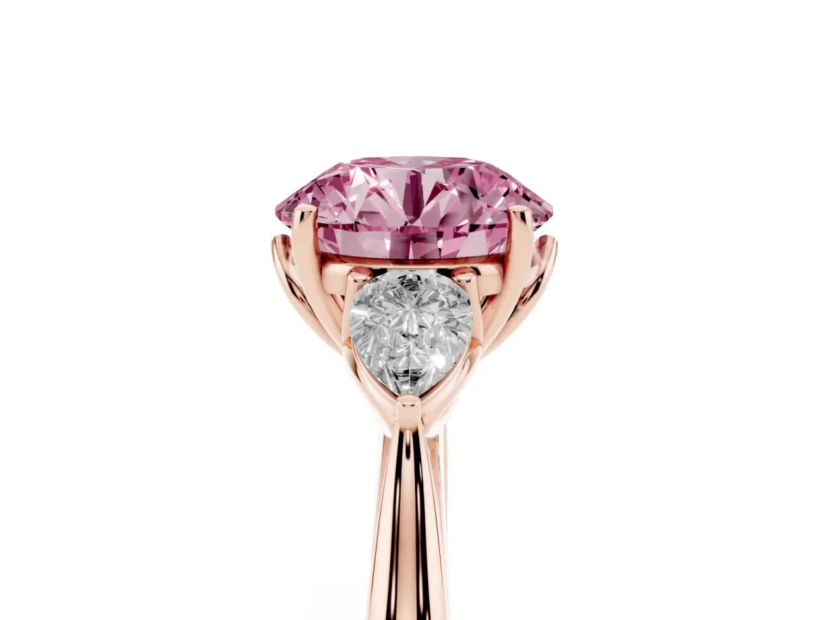 Fancy Pink Round Cut Diamond Three-Stone Ring with Pear Side Stones and Prong Setting Rose gold