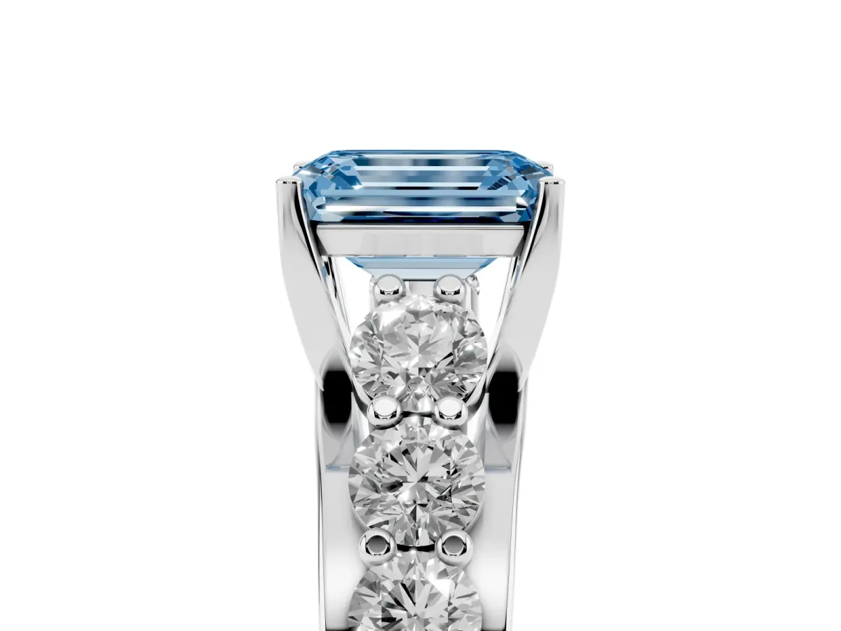 Fancy Blue Emerald Cut Diamond Engagement Ring with Pavé Band and Four-Prong Setting Silver