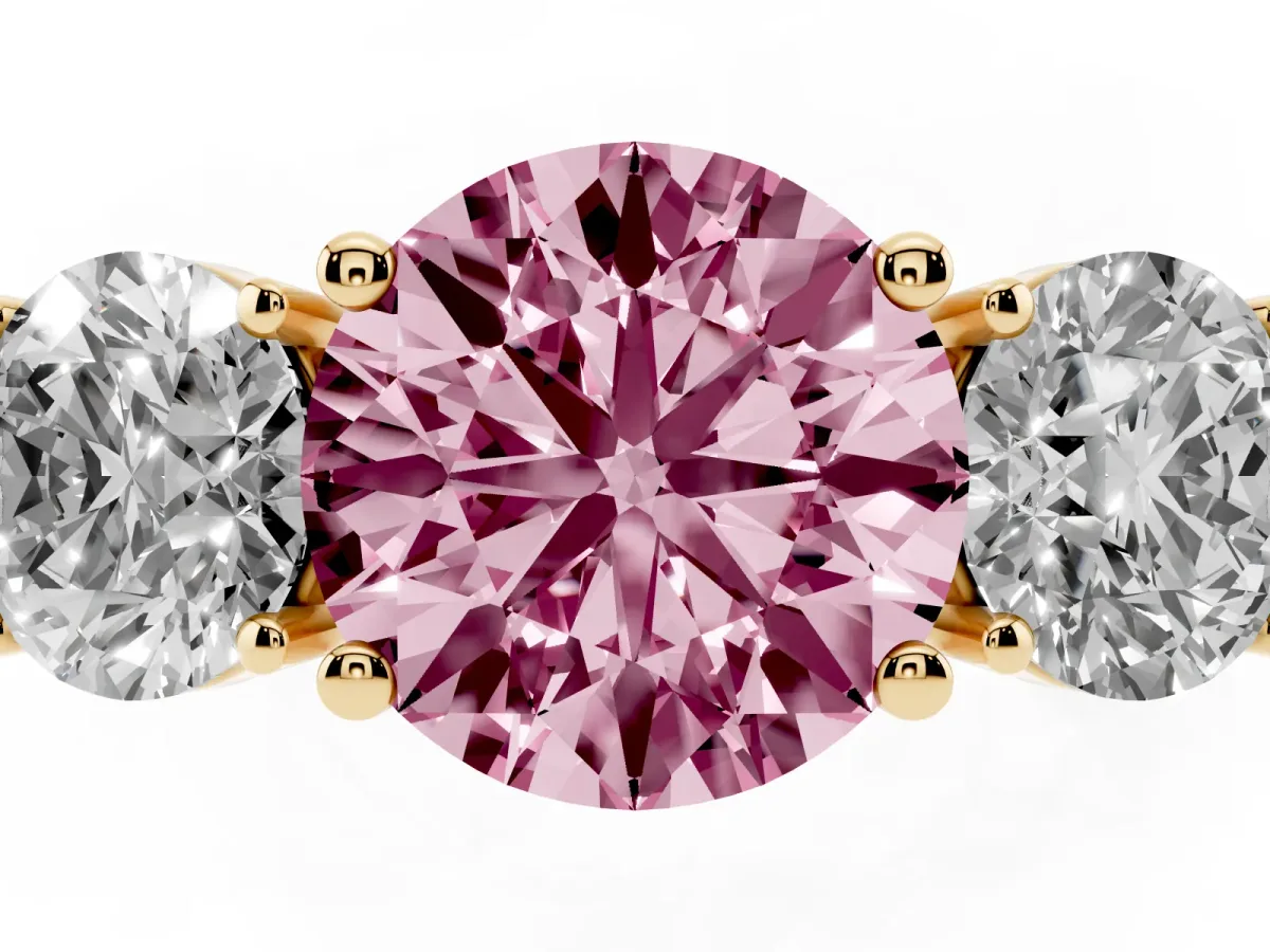 Fancy Pink Three-Stone Round Cut Cut Diamond Engagement Ring with Flat Band and Four-Prong Setting Yellow gold