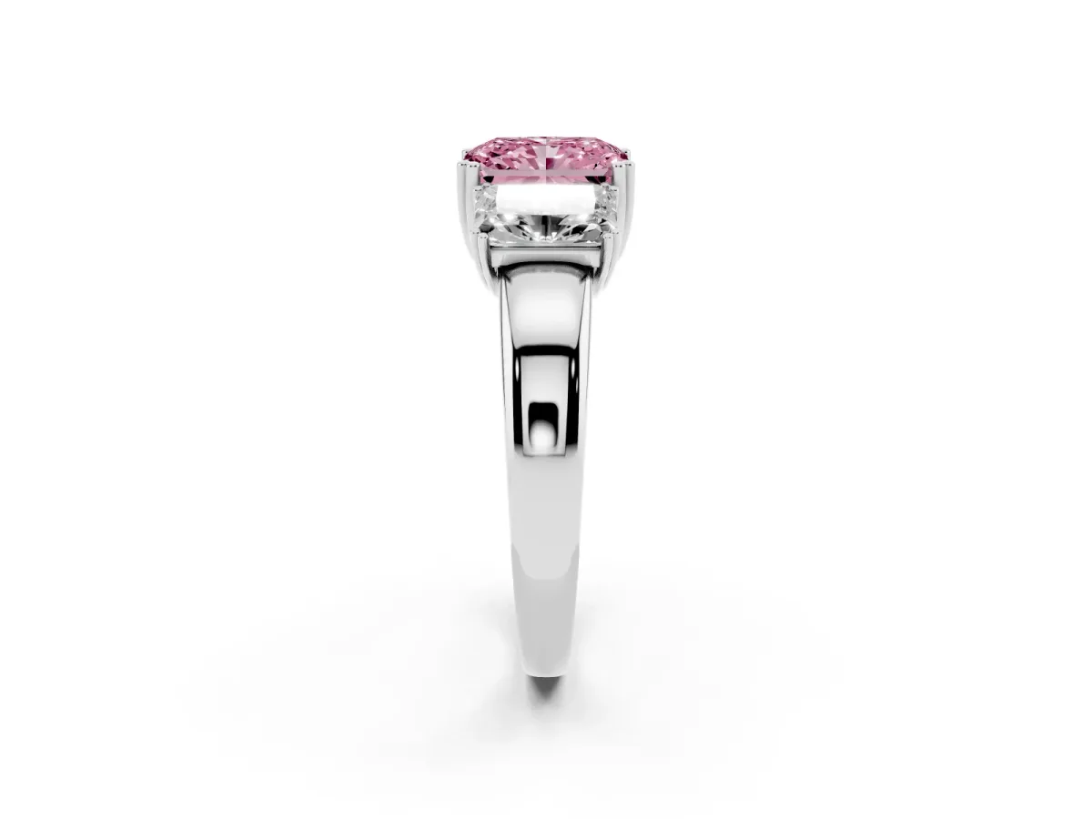 Fancy Pink Three-Stone Radiant Cut Cut Diamond Ring with Channel Set Band and Four-Prong Setting Platinum